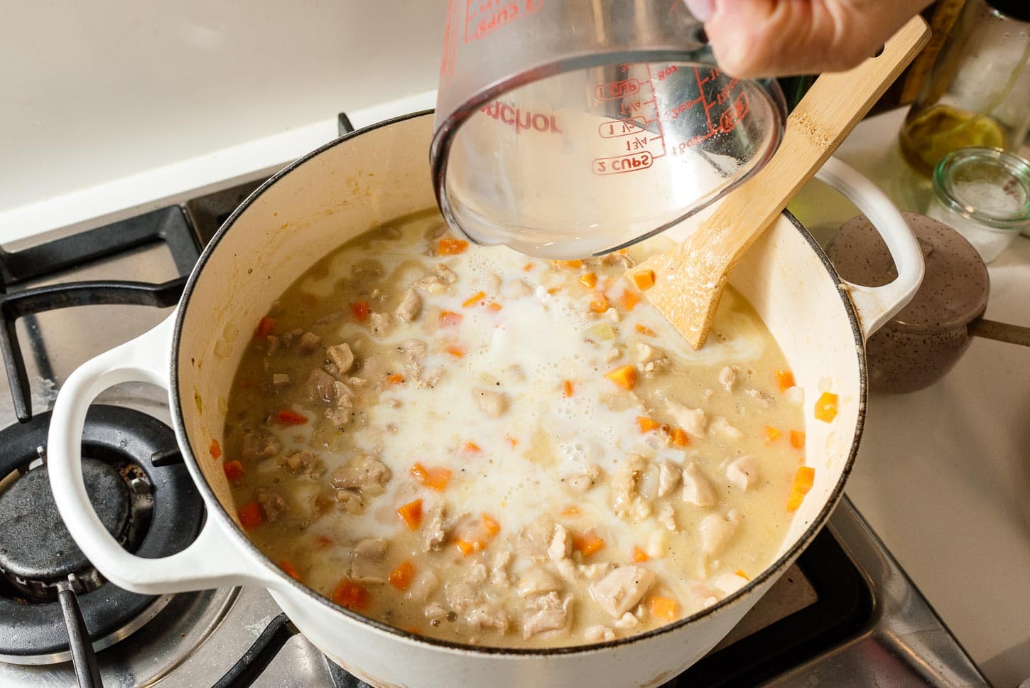 Adding Milk to Creamy Spinach Chicken Pot Pie Pasta | www.iamafoodblog.com