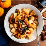 A warm and comforting bowl of fall pasta: pan roasted honeynut squash creamy garlicky noodles. #pasta #dinner #recipe #garlic #honeynutsquash #honeynut #squ