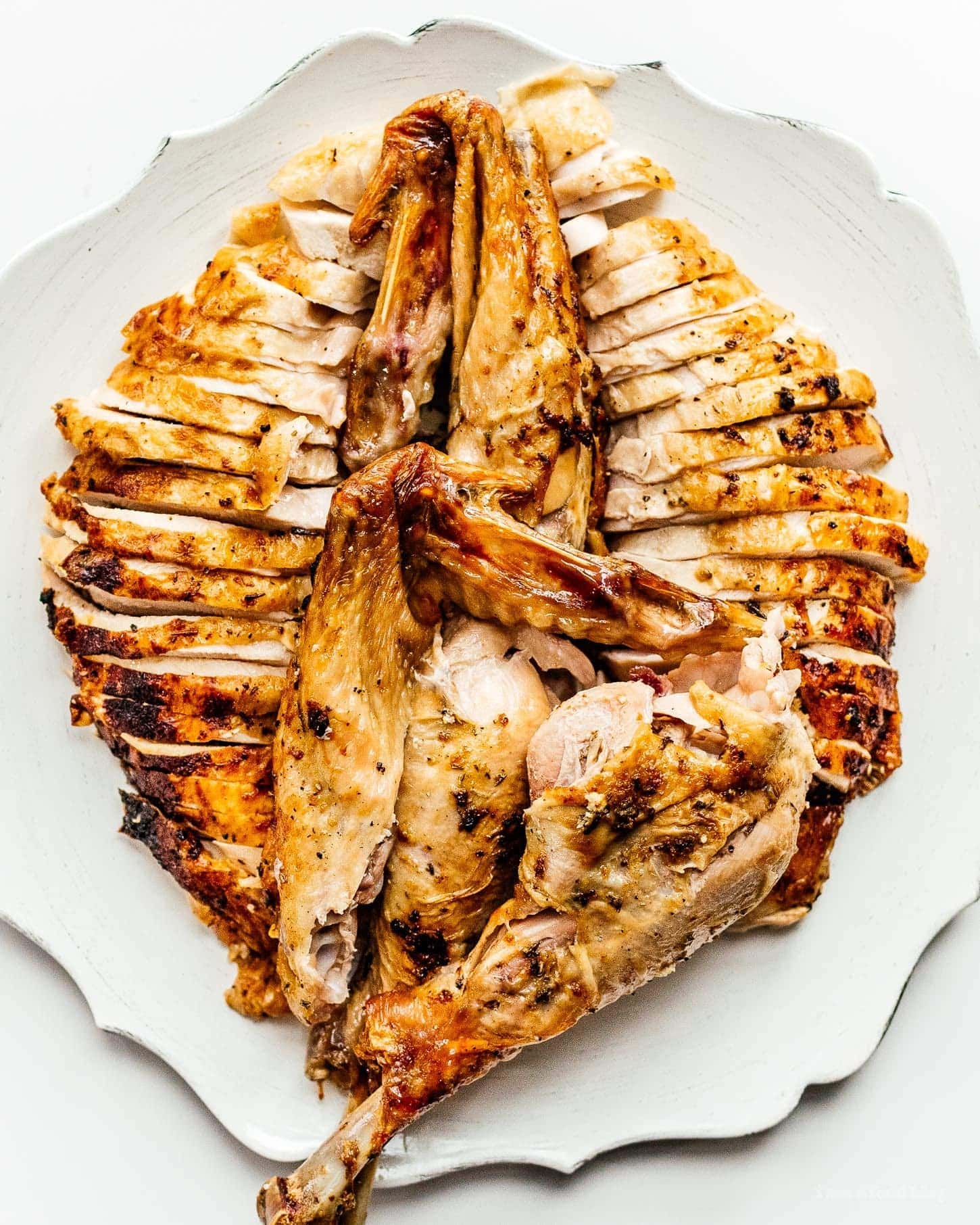 spatchcock turkey on a platter | www.iamafoodblog.com